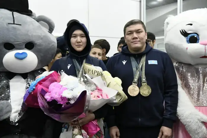 Столичные спортсмены, защищавшие честь страны в Японии, вернулись домой (5)