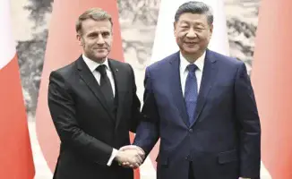 Французский президент находит в Китае 'жесткий орех' для своих дипломатических инструментов